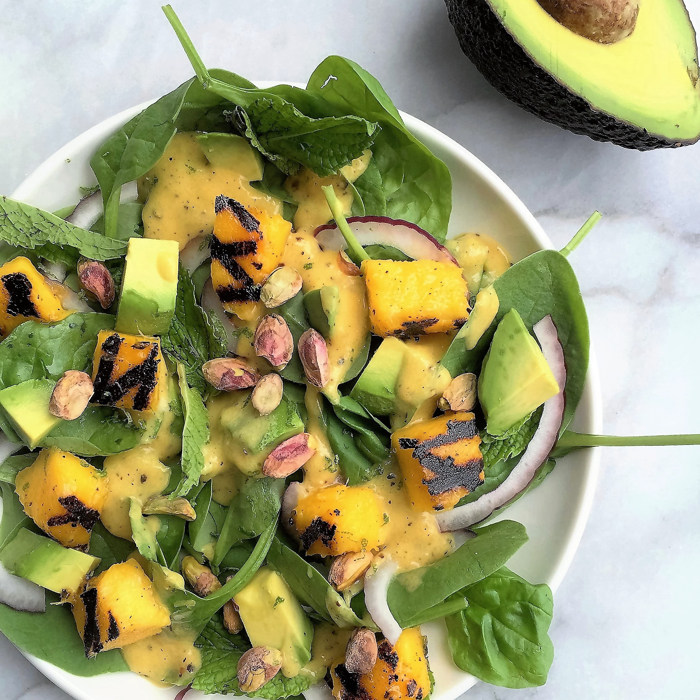 grilled mango and spinach salad with avocado tasteover