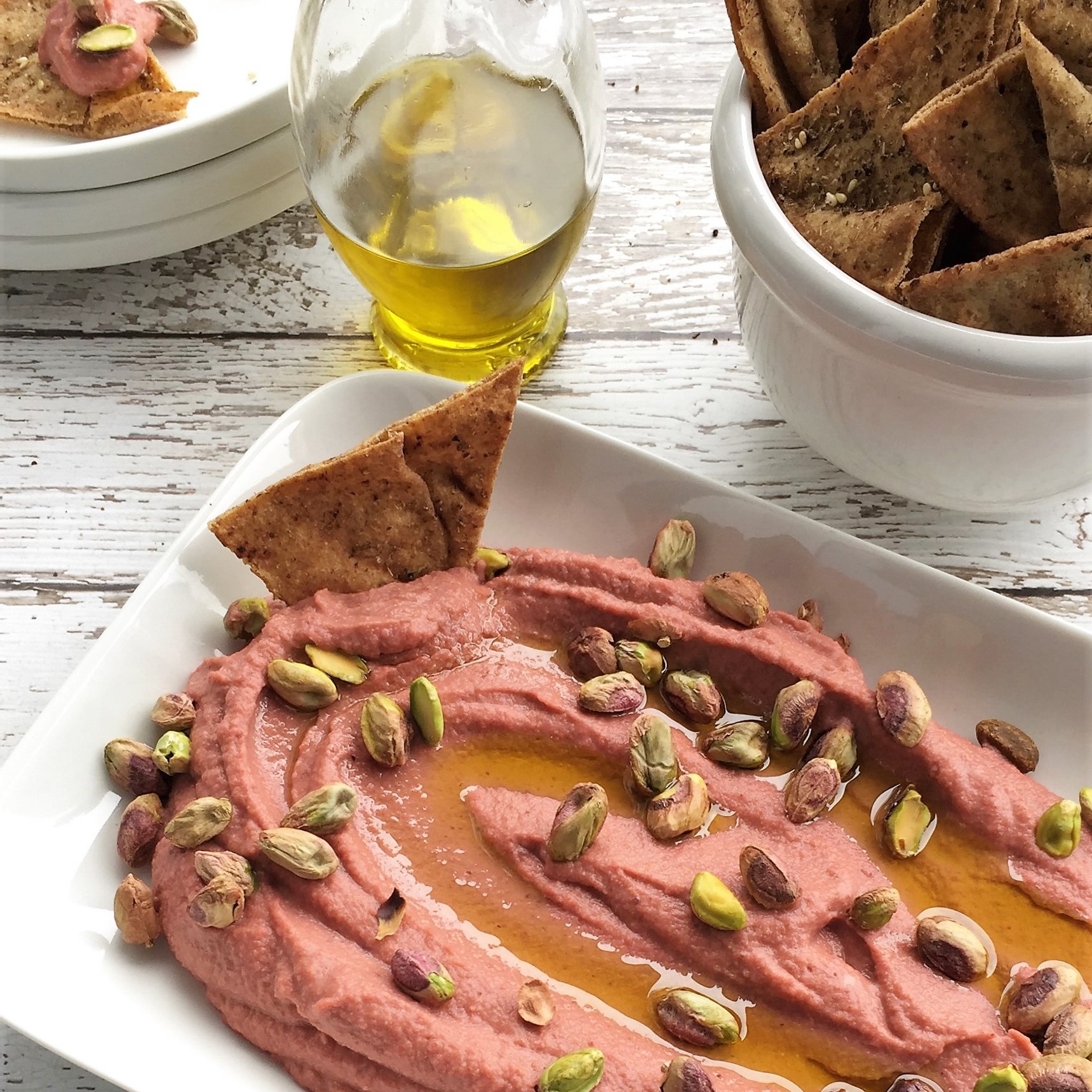 lemony beet hummus with poached pistachios