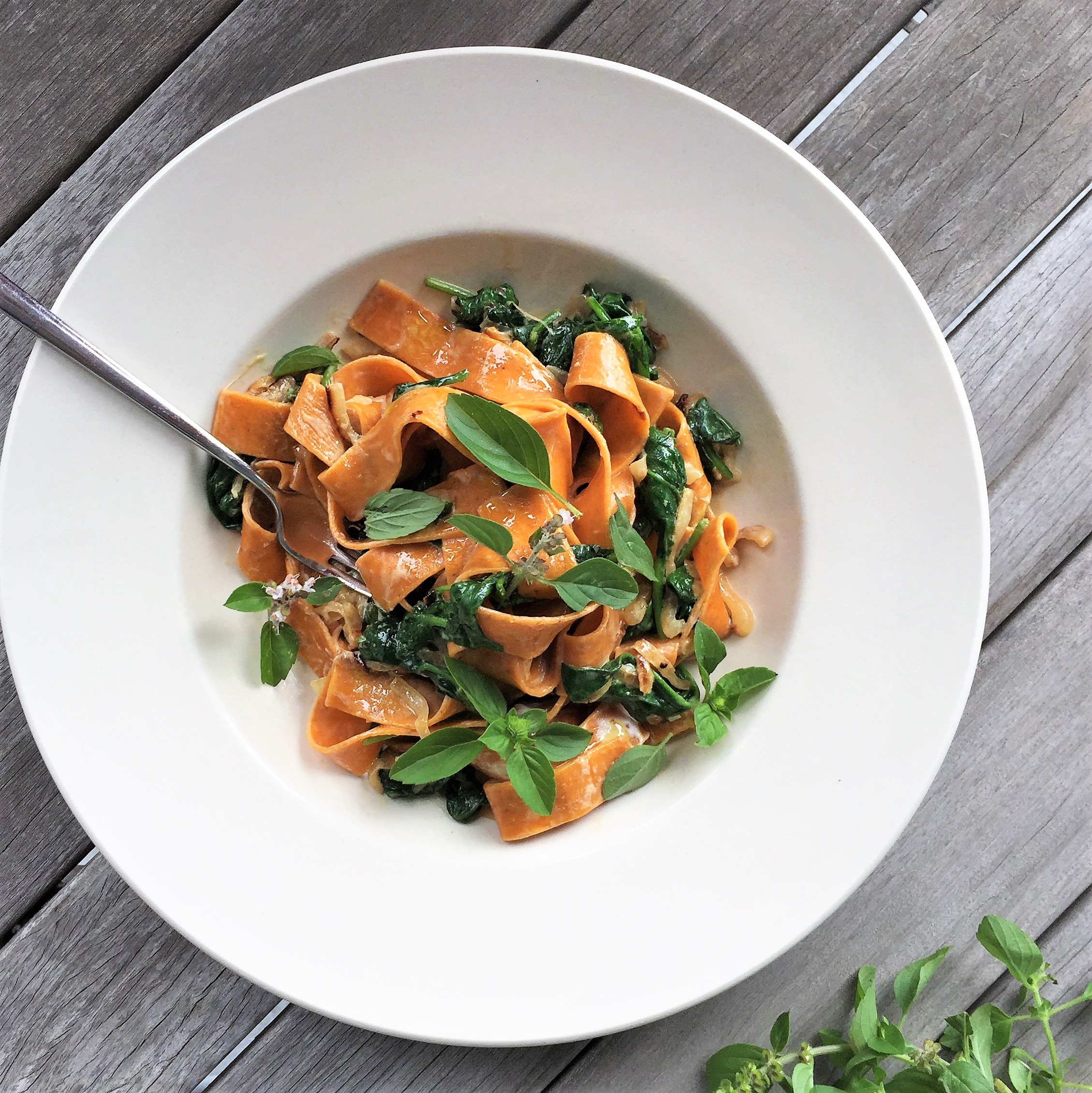 sweet potato pappardelle with greens and goat cheese
