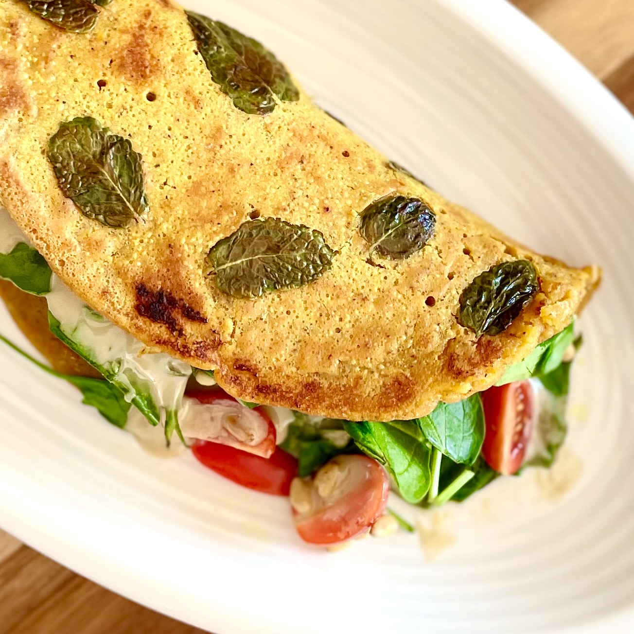 mediterranean plant-based herbed chickpea omelet_overhead view_closeup