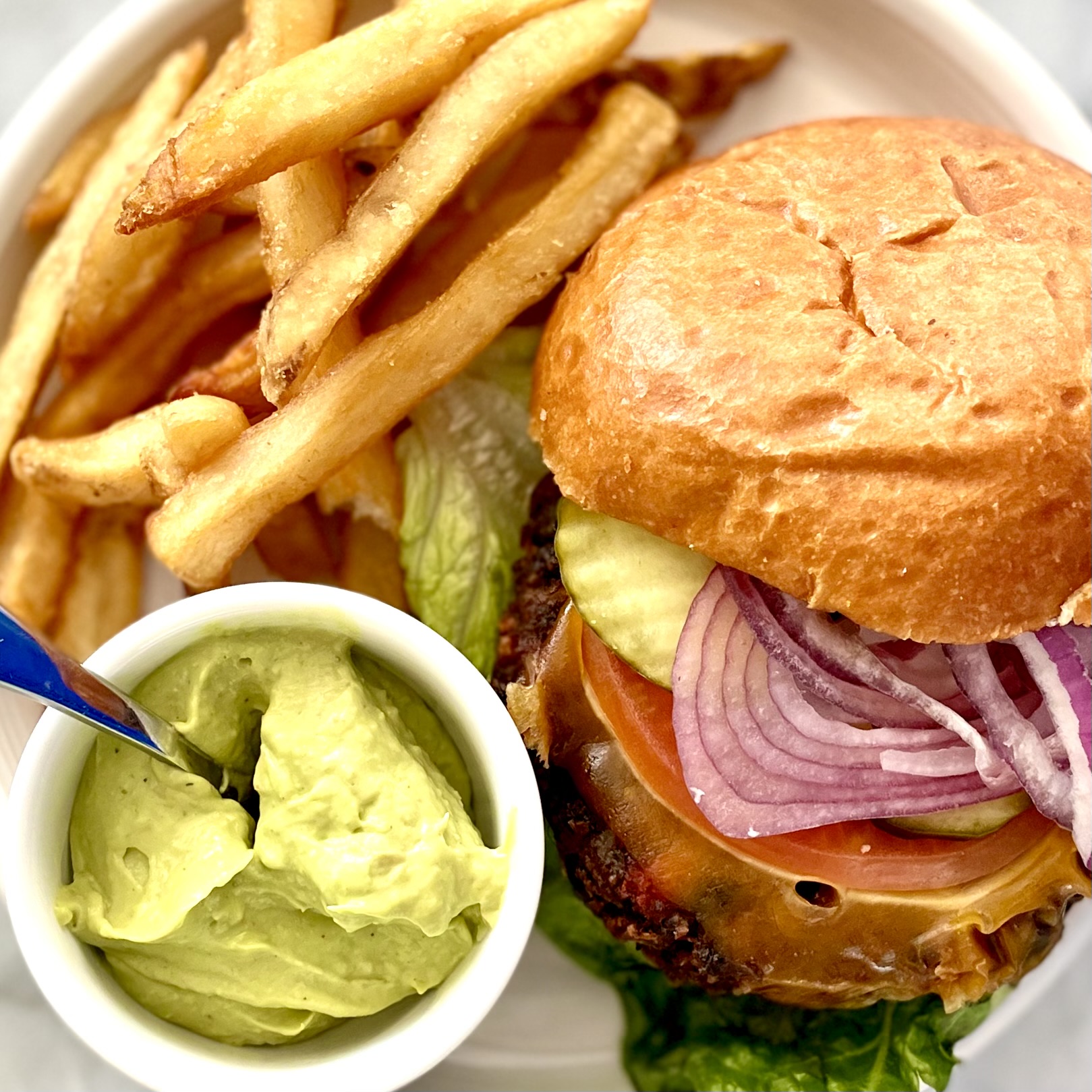 avocado anything dip with veggie burger and fries