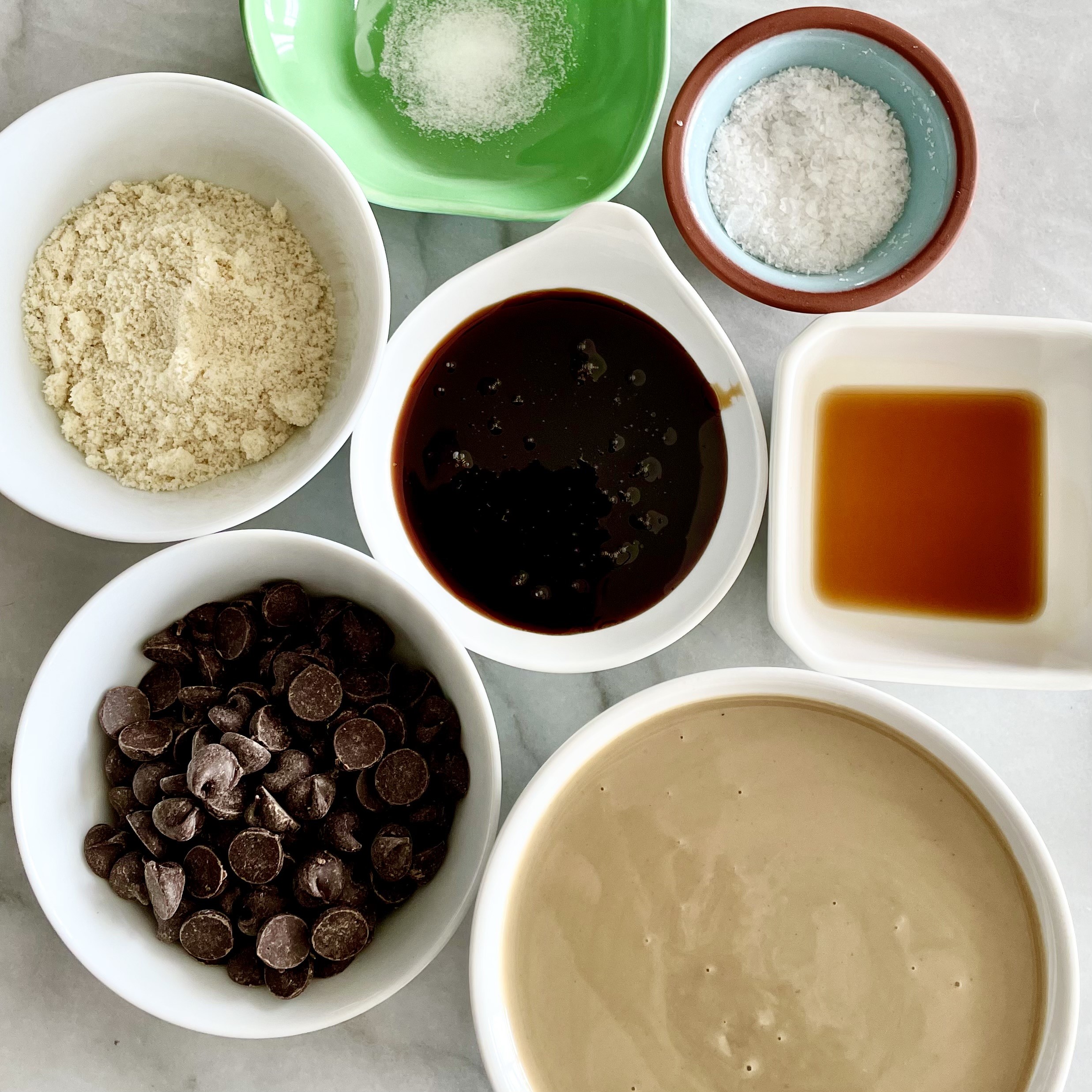 ingredients to make chocolate tahini fudge with sea salt